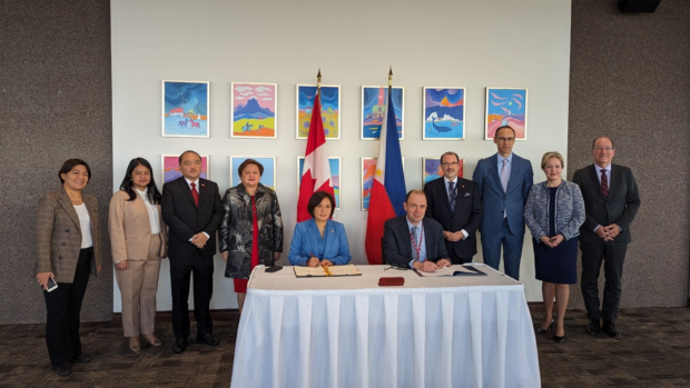 Philippine Ambassador to Canada Maria Andrelita Austria and Assistant Deputy Minister Adam Burns, Programs Sector, Department of Fisheries and Oceans,(seated) signed the Arrangement on the Dark Vessel Detection (DVD) System between NCWC and the DFO of Canada at the sidelines of the 6th Joint Commission for Bilateral Cooperation (JCBC) in Ottawa, Canada on 12 October 2023, while officials of the DFA, DFO Canada and GAC Canada look on.